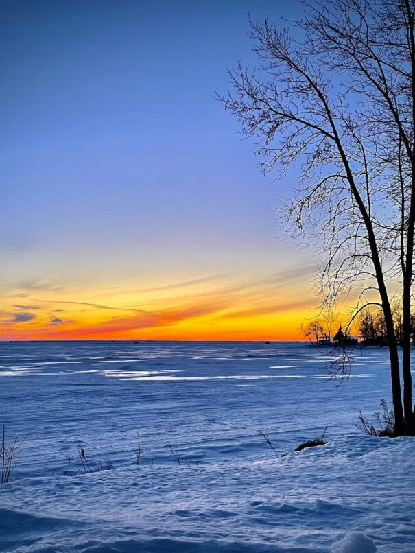 Breathtaking winter sunset over Mille Lacs Lake